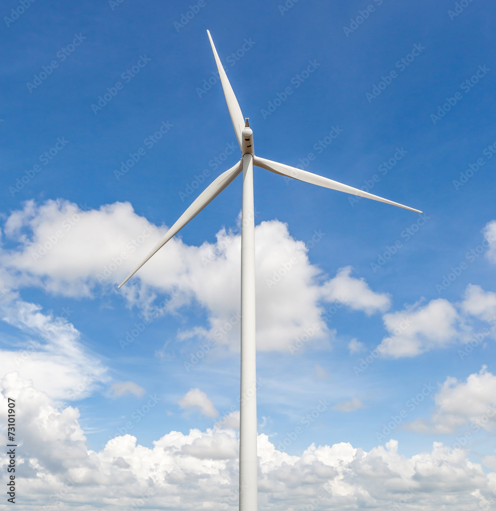 From the behind of wind turbine in beautiful cloudy blue sky bac From the behind of wind turbine in beautiful cloudy blue sky bac