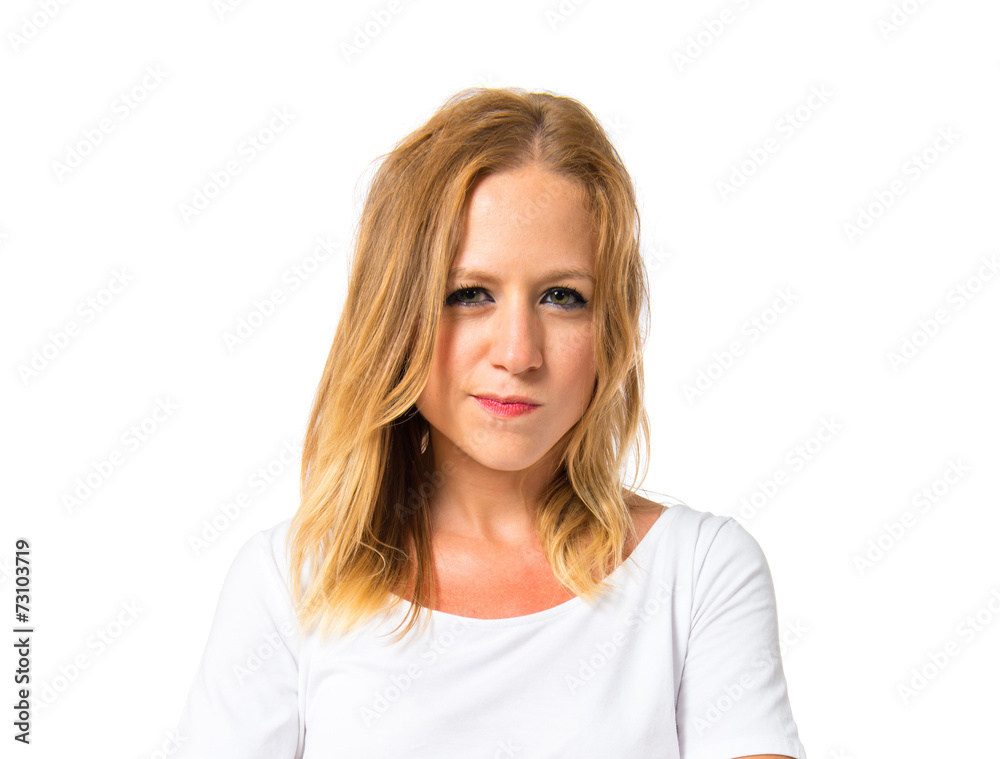 Girl with her arms crossed over white background Girl with her arms crossed over white background
