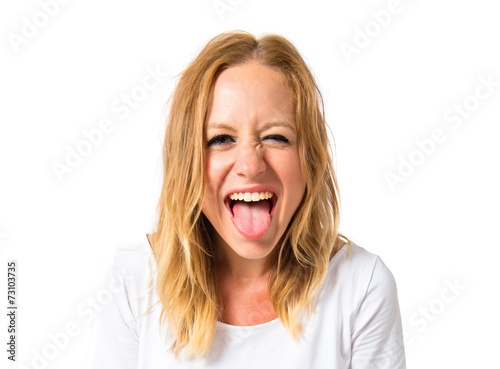 Girl doing a joke over isolated white background