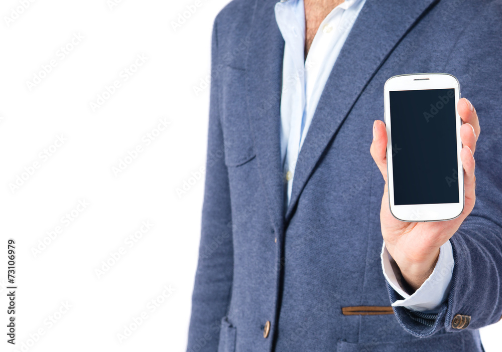 Brunetteman showing a mobile over white background Brunetteman showing a mobile over white background