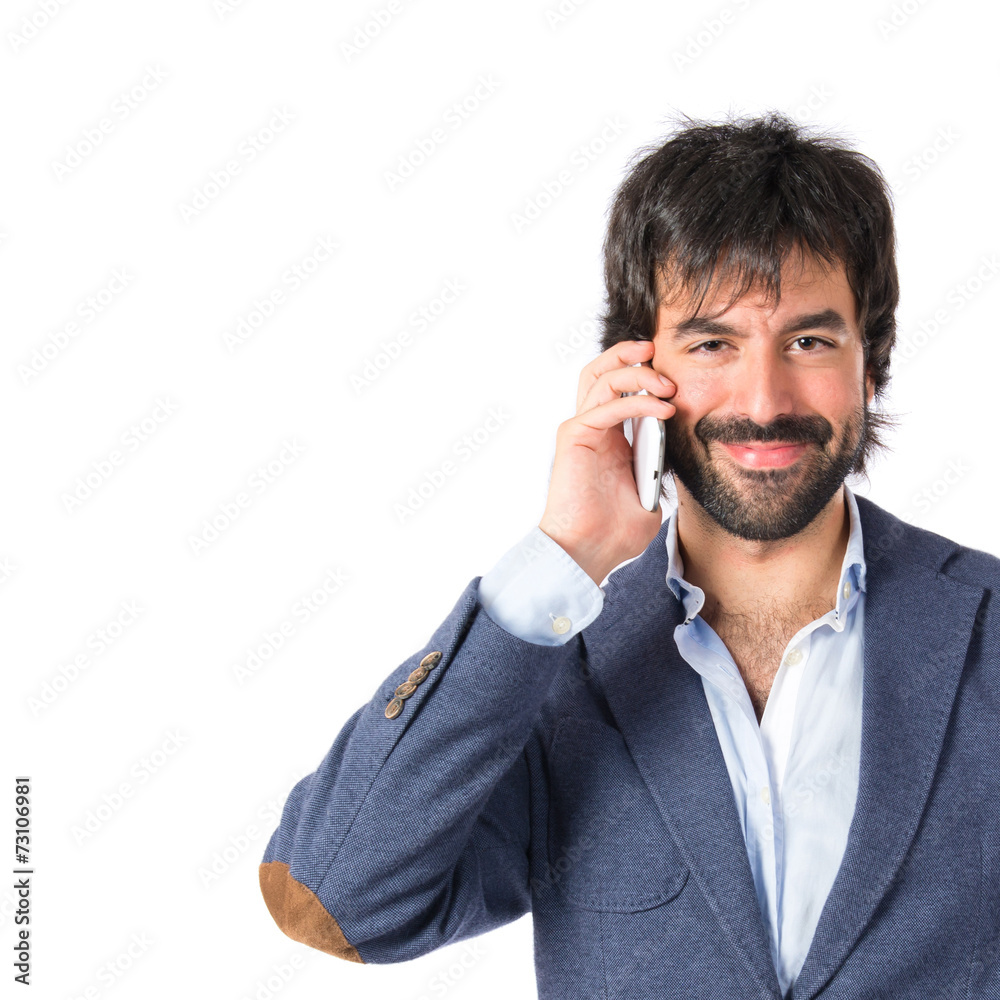 Brunetteman showing a mobile over white background Brunetteman showing a mobile over white background