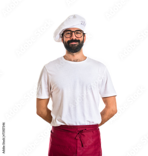 Chef smiling over white background