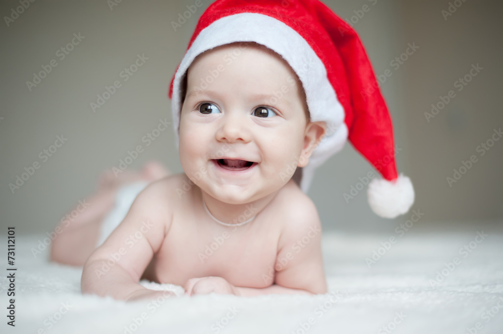 christmas cute baby boy/girl in Santa's hat christmas cute baby boy/girl in Santa's hat