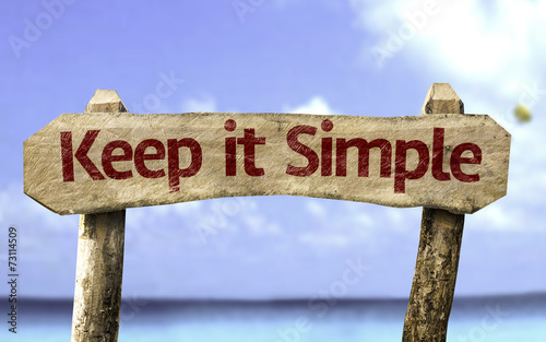 Fotografia Keep It Simple sign with a beach on background