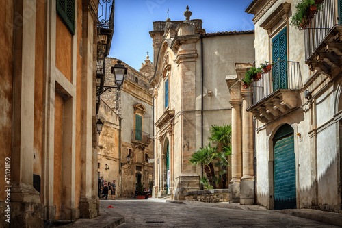Scenic street in Ragusa, Sicily, Italy photo
