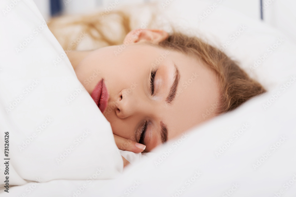 Woman relaxing in bed Woman relaxing in bed