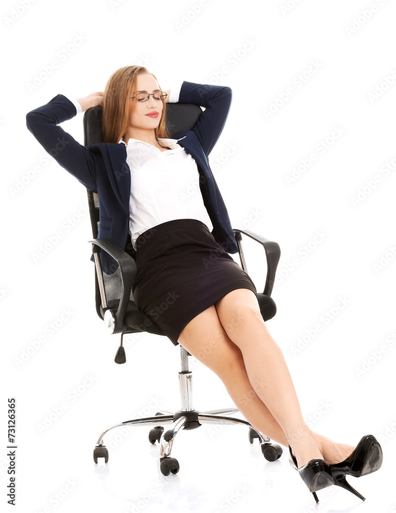 Fototapeta premium Businesswoman relaxing on a chair