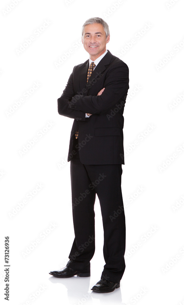 Portrait Of Confident Businessman With Arms Crossed Portrait Of Confident Businessman With Arms Crossed