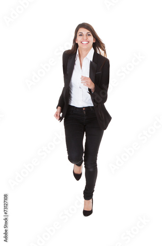 Happy Businesswoman Running Over White Background
