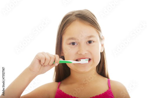 Little girl brushing teeth