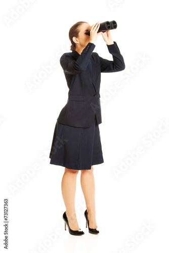 Businesswoman with a binocular © Piotr Marcinski
