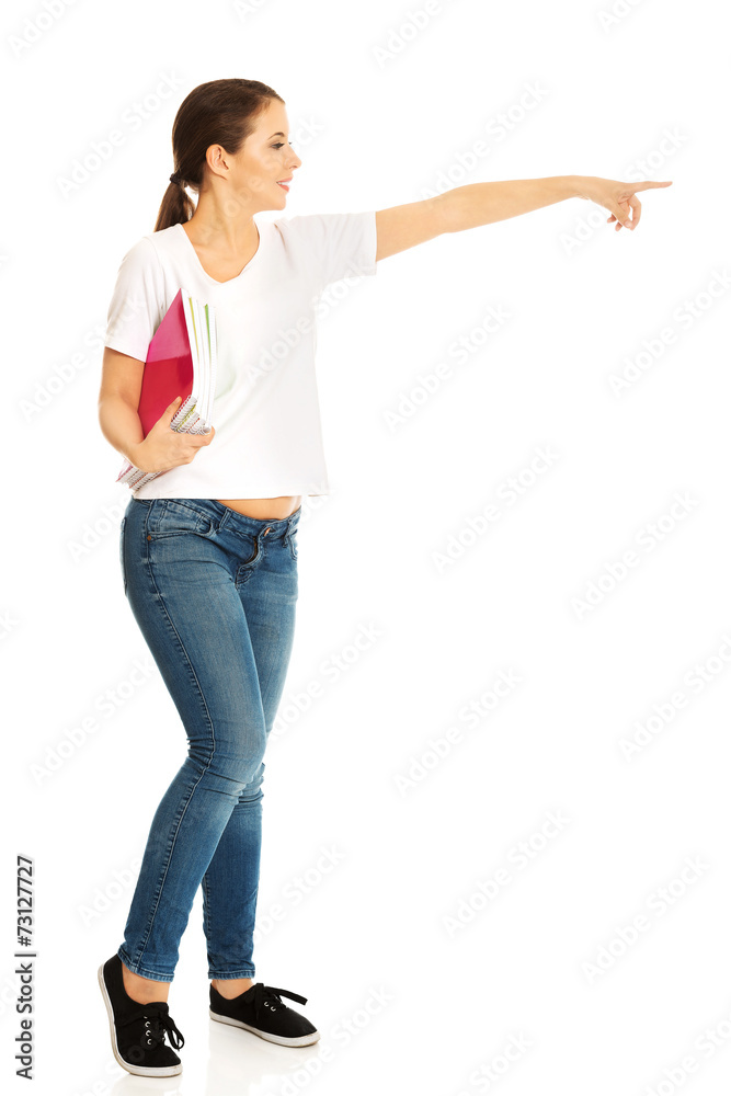 Woman holding notebooks Woman holding notebooks