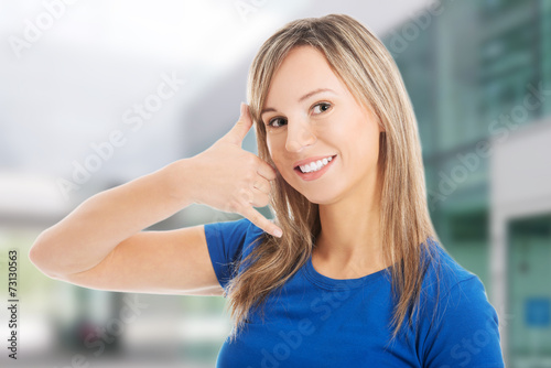Free Download Woman making phone gesture - GFXLoad