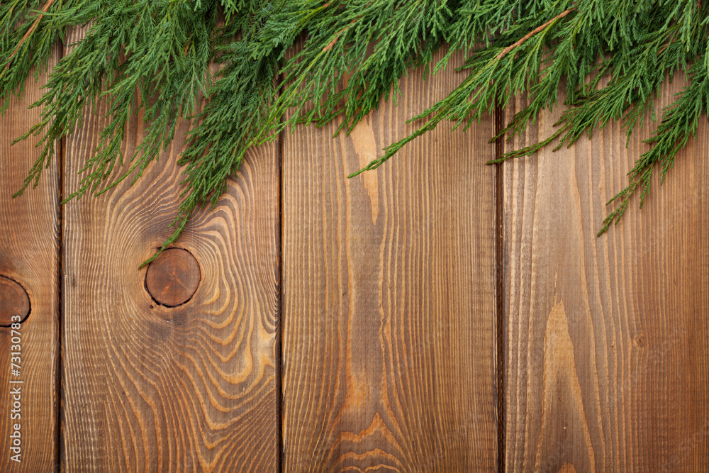 Christmas wooden background with fir tree Christmas wooden background with fir tree