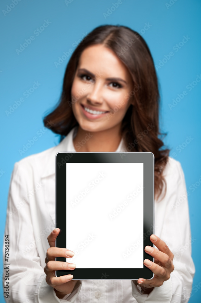 Businesswoman showing blank tablet pc, on blue Businesswoman showing blank tablet pc, on blue