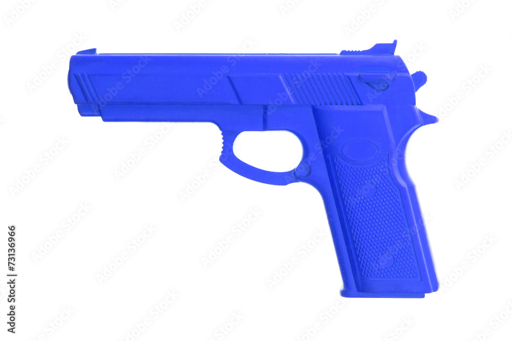 Blue training gun isolated on white Blue training gun isolated on white