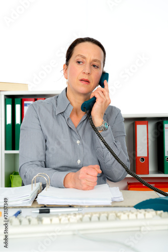 businesswoman has a disagreeable phone call