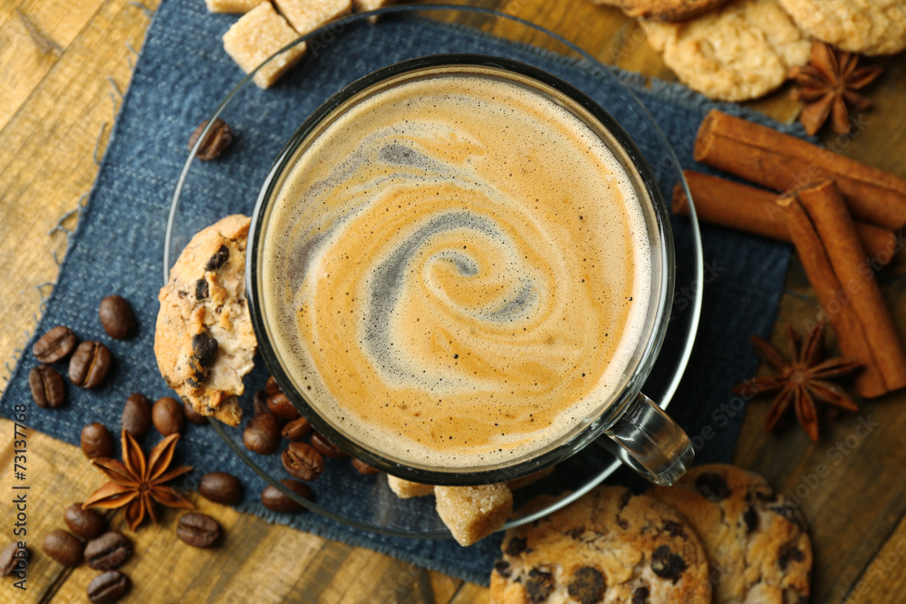 Cup of coffee and chocolate chip cookies on wooden background Cup of coffee and chocolate chip cookies on wooden background