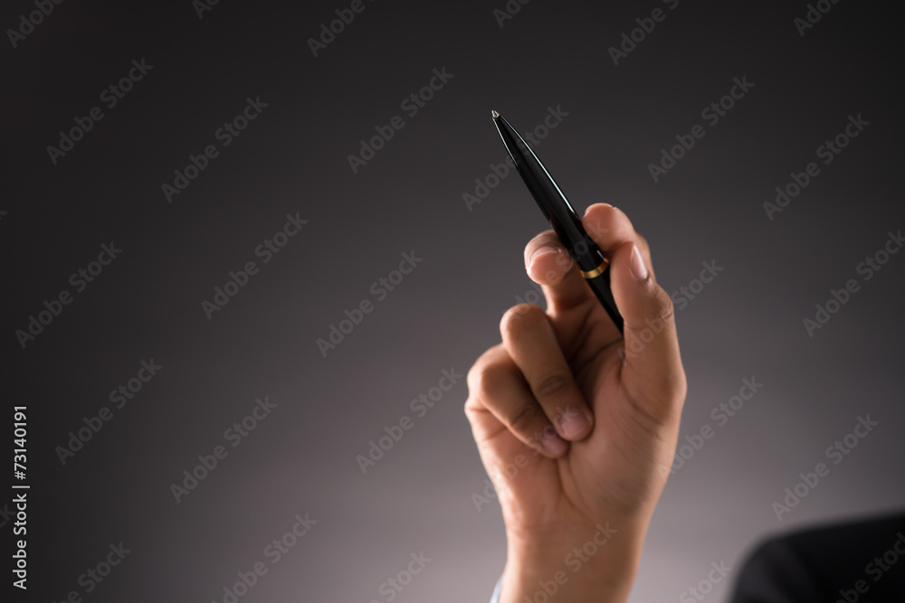 Hand with a pen Hand with a pen