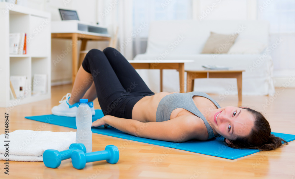 Young attractive woman having a rest after sport Young attractive woman having a rest after sport