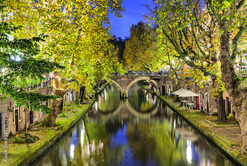 Double arc bridge across canal in the center of Utrecht