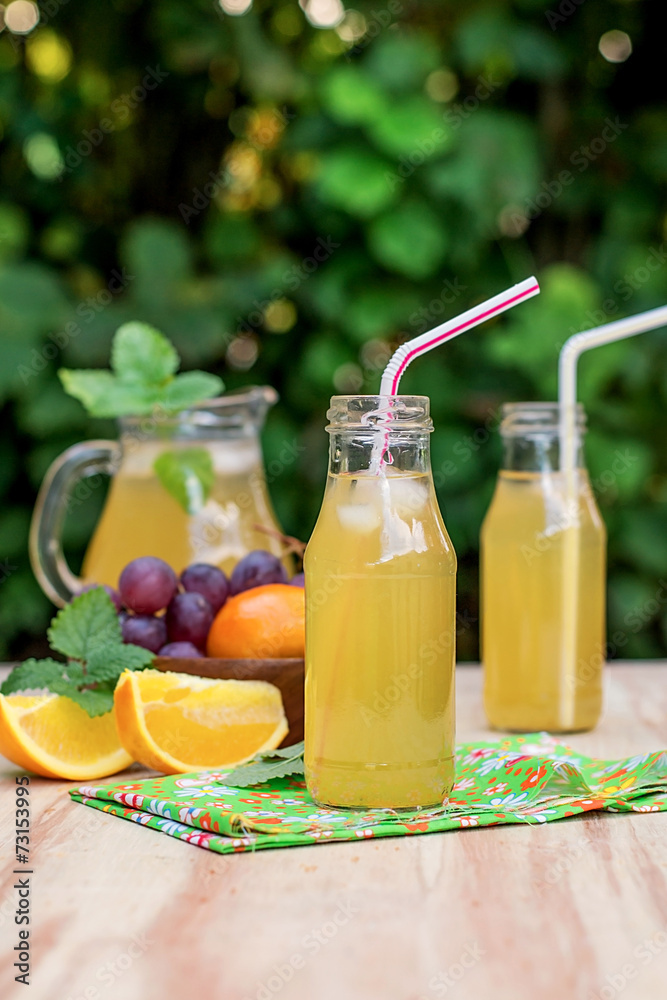 Fresh iced drinks with grapes and orange Fresh iced drinks with grapes and orange
