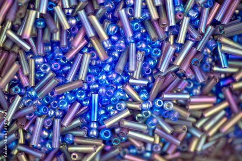 Macro closeup of blue and multi-colored beads
