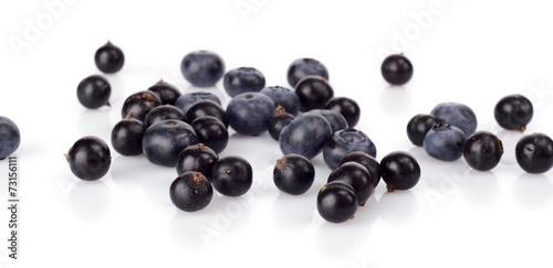 Several scattered blueberries isolated on white