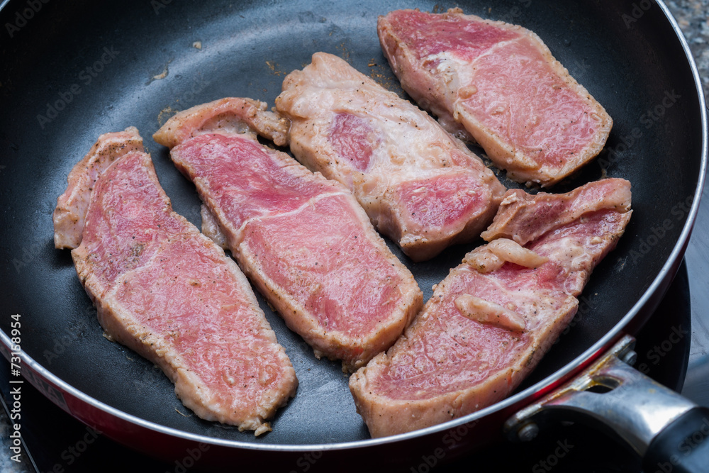 Raw sliced pork grill on the pan