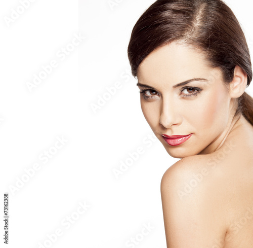 young beautiful woman posing on a white background