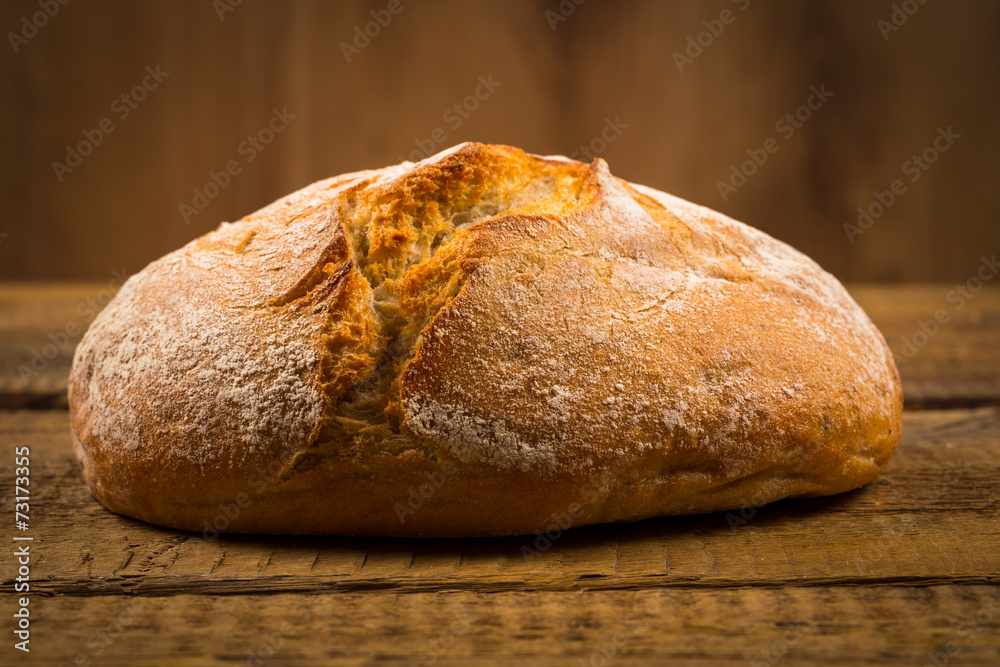 white bread over wooden background