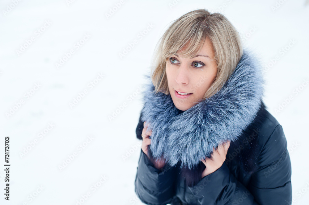 Smiling beautiful girl portrait in winter time with snow Smiling beautiful girl portrait in winter time with snow