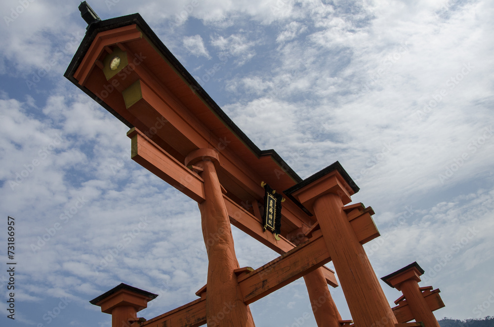 Torii gate at Itukushima shrine in Hiroshima, Japan Torii gate at Itukushima shrine in Hiroshima, Japan