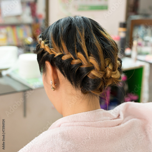 long braid creative brown hair style in salon beauty