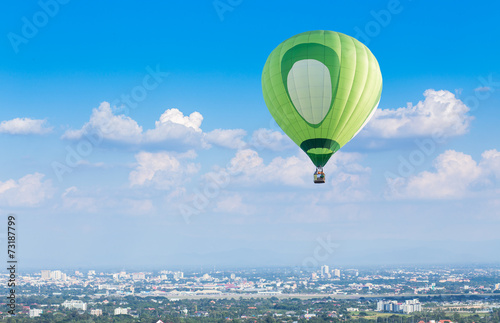 Hot air balloon with blue sky background © littlestocker