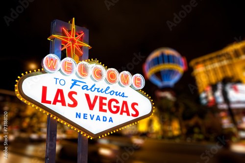 Canvas Print Las vegas sign and strip street background
