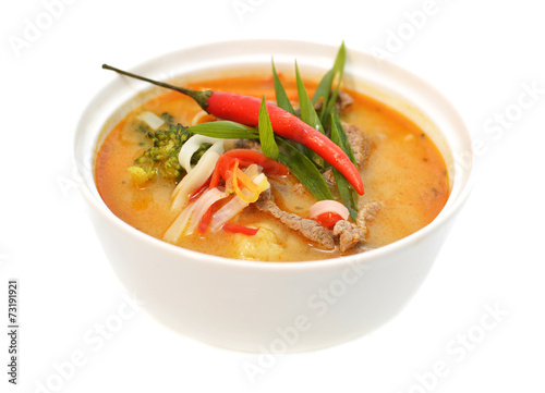 Thai spicy soup with beef, chili and vegetables