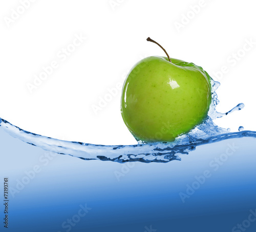 green apple in blue water