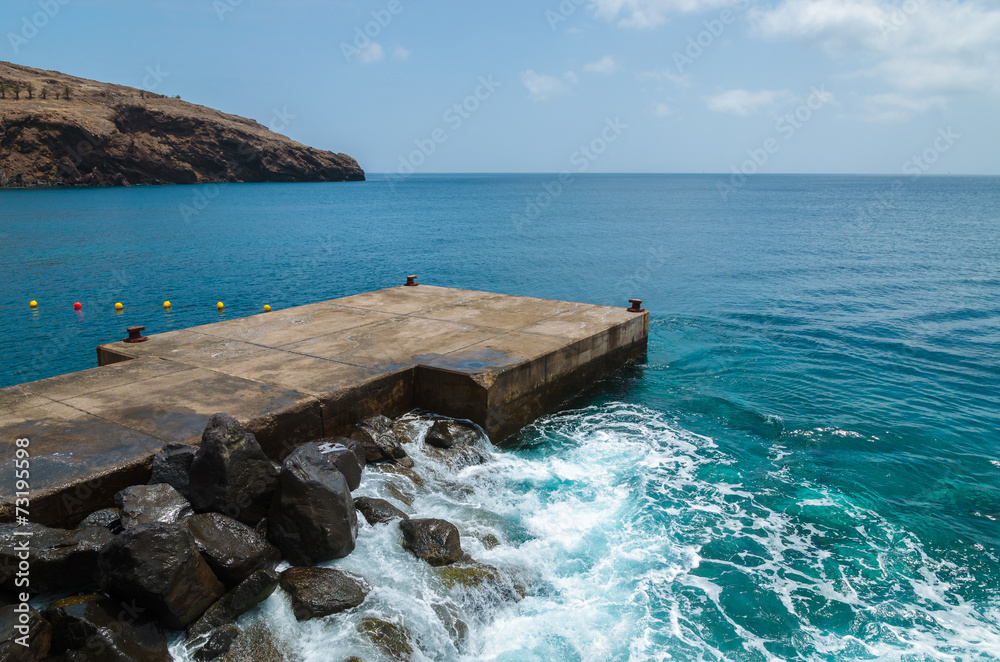 Ocean wave hit concrete jetty, Madeira island, Portugal