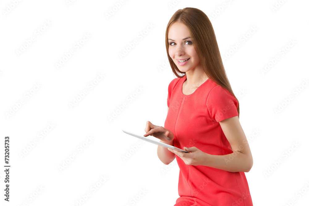 Happy beauty woman texting on a tablet Happy beauty woman texting on a tablet