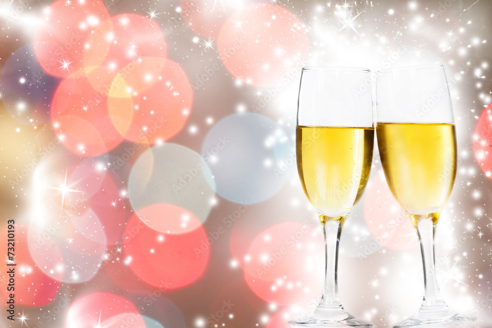Glasses with champagne against fireworks Glasses with champagne against fireworks