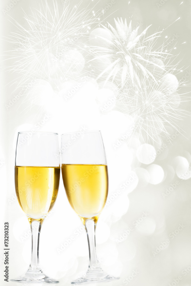 Glasses with champagne against fireworks Glasses with champagne against fireworks