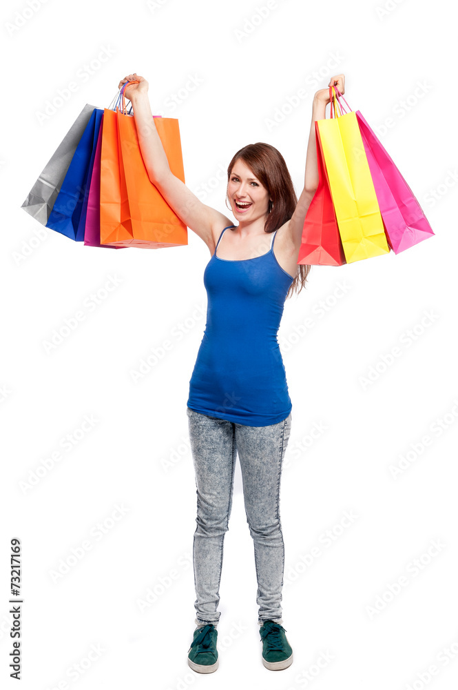 Happy Teenage Girl with Bright Coloured Shopping Bags Happy Teenage Girl with Bright Coloured Shopping Bags