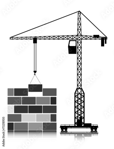 tower crane builds the house of blocks