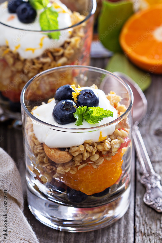 Breakfast parfait with oranges, granola, yogurt Breakfast parfait with oranges, granola, yogurt