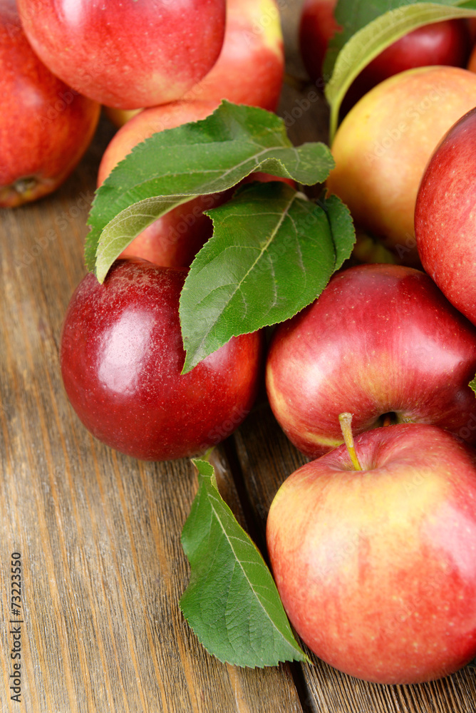 Ripe red apples on wooden background Ripe red apples on wooden background