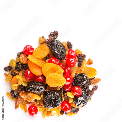Mix variety of dried fruit over white background
