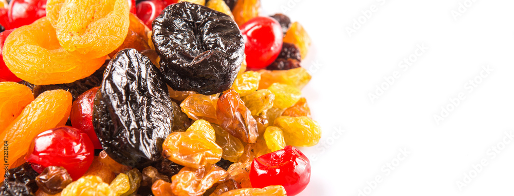 Mix variety of dried fruit over white background Mix variety of dried fruit over white background