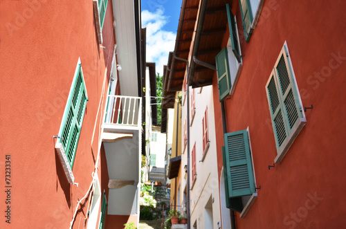 Narrow street of Varenna town at the lake Como, Italy photo