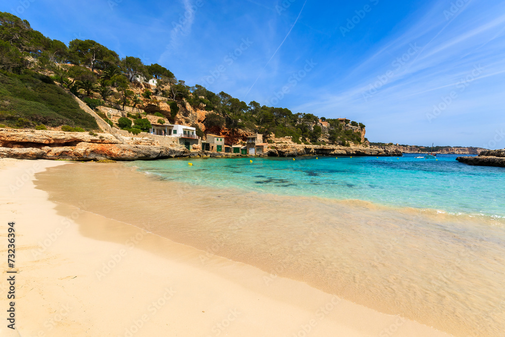Sandy beach in beautiful bay, Cala Llombards, Majorca island